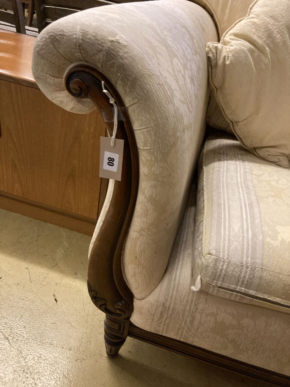 A Victorian style mahogany two seater scroll arm settee, width 170cm, depth 90cm, height 80cm